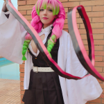 ```html Cosplay Costume Guide: Pink & Green Braided Hair Meets Traditional Japanese Warrior Chic Cosplay Costume Guide: Pink & Green Braided Hair Meets Traditional Japanese Warrior Chic What does love look like? If you’re a die-hard anime fan like me, it might look a lot like Mitsuri Kanroji—the Love Hashira from Demon Slayer: Kimetsu no Yaiba. Picture vibrant pink and green braided hair (literal cotton candy vibes), a traditional yet fierce Japanese-inspired outfit, and a ribbon-like sword that radiates power and personality. Sound enticing? Sit tight, because I’m about to swoop you into the tantalizing world of cosplay where precision meets passion, and sass meets style. The Colorful Charm of Mitsuri Kanroji Just imagine this: you’re wrapped in a black pleated skirt paired with a clean, simple white top, topped off with a distinct white haori overcoat. This juxtaposition—soft, feminine florals woven into the electric fierceness of a demon-slaying warrior—could only belong to Mitsuri Kanroji. Her costume melds tradition with sass, a mix that stomps stereotypes in its pastel-colored combat boots. Add the pink and black ribbon sword wielded with flair, and you’ve got yourself a walking, talking Valentine’s Day card that can also probably slay demons. Iconic, right? The Symbolism of Love (and Candy-Colored Hair) Mitsuri’s pink and green braids are more than just quirky anime hair—they’re a declaration. A declaration of love, individuality, and maybe just a little “Yes, I can bench-press you.” When you don her hairstyle, you’re not just playing a character; you’re embodying a joyful bravery, one that screams, “I’m here, I’m fierce, and I’ll cut you with love (metaphorically, of course).” To achieve those luscious locks of love, grab yourself a ready-made Mitsuri wig on Amazon or EZCosplay's version. Stylist tip: Give it a light spritz of a setting spray to keep every strand in place while you strike those power poses! Shop the Look: A Breakdown Vibrant pink and green braids: Get your Mitsuri wig here. White top and black pleated skirt: Raid your closet or snag them on Amazon.ca. White haori overcoat: Steal Mitsuri’s thunder at Unibuypluscosplay. Pink and black ribbon-like sword: It’s not cosplay until there’s a prop, and luckily, EZCosplay has you covered. The Storytelling Magic of Cosplay Here’s a truth bomb that no one’s ready for: cosplay isn’t just about looking cool—though, let’s be real, we do that exceptionally well. It’s about *becoming* the characters you adore. Mitsuri is more than a candy-haired anime girl; she’s a symbol of unapologetic individuality, love-fueled strength, and quiet optimism. Cosplayers don’t just dress up—they step into those larger-than-life shoes, owning every seam, thread, and ogling glance. And that’s also why picking the perfect cosplay costume matters. Whether you’re at Comic-Con or snapping pics for the ‘Gram, you don’t want to skimp on details. Trust me, I’ve learned it the hard way—no one EVER forgets or forgives poorly braided wigs. (True story.) Pro Tips for Channeling Your Inner Mitsuri Breathe Life into the Character: Mitsuri’s fighting style is called Love Breathing. Let your photos radiate warmth with candid smiles and a touch of vulnerability! Pose with Confidence: Want to nail that ‘anime warrior in a pastel dream’ feel? Angle your sword diagonally for action shots. Not a sword-swinger? Rest it on your shoulder, cool-kid style, and strike a smirk that says, “Just another day saving humankind.” Choose Flawless Makeup: Keep it light and breezy—pink cheeks and soft liner to emphasize anime innocence. Sephora’s Soft Glam Palette is a lifesaver here. Brick Walls & Bigger Messages Ah, the setting of our showcased cosplay—the humble brick wall backdrop. Chic yet understated, it’s a great metaphor for the story of Mitsuri (and a cosplay cheat code for elevating your pics). On the surface, she’s all sweetness and light—a pink and green confection against a world of earthy tones. But look a little closer, and you’ll see the grit: the warrior spirit hiding beyond the ribbons. Cosplay is exactly that—it’s taking the ordinary and turning it extraordinary. A little love. A little fight. A whole lot of fabulous. The Cosplay Community: Come As You Are If you’re reading this and thinking, “I could never pull that off,” first off—wrong. Mitsuri herself would remind you that self-expression is a love letter to yourself. Cosplay is a celebration, not a competition. Don your pink braids proudly. Rock that floral-edged sword shoulder-to-shoulder with others who feel the same. Even if you’re not at Mitsuri peak-level of costume mastery, there’s a place for you in the cosplay world. Trust me, the Demon Slayer fandom alone will welcome you with open (and stylishly gloved) arms. Where to Buy Your Next Obsession The best part about cosplay? You never have to go it alone. From wigs to accessories, here are two trusty places to get your Mitsuri cosplay costume: EZCosplay for precision-perfect costumes. Unibuypluscosplay for budget-friendly options with flair! While you’re at it, no harm in browsing Amazon to complete the beauty-and-prop essentials. Ready to Slay (Lovingly)? Channel your inner Mitsuri Kanroji and be the pastel powerhouse you were meant to be! Take a stroll through EZCosplay and Unibuypluscosplay to find your next wearable masterpiece. Remember: love is a battlefield, and a fashionable one at that. Go forth, slay demons, and break hearts—preferably in that order. ```