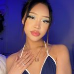 Blue Velvet Dreams: How to Rock a Luxurious Statement Halter Dress with Bold Makeup