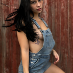 Modern Bohemian Style: Deep Blue Denim Overalls, White Minimalist Top, and Butterfly Tattoo Aesthetic